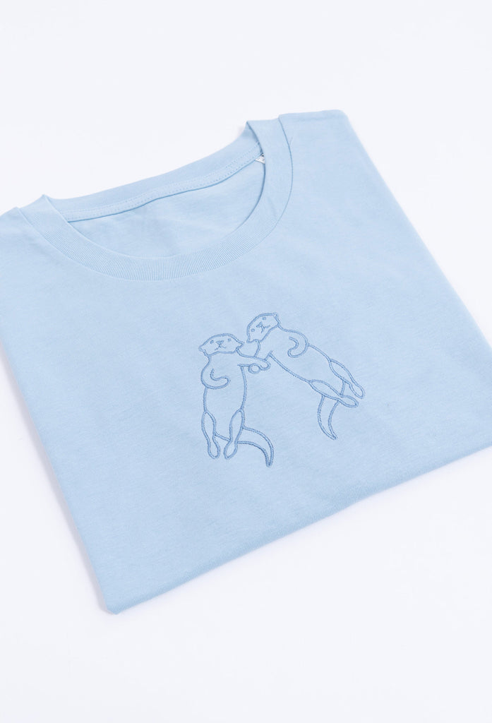 family of otters unisex cropped t-shirt Big Wild Thought