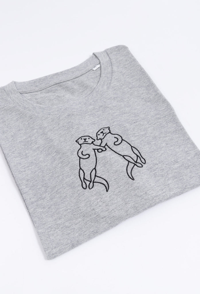 family of otters unisex cropped t-shirt Big Wild Thought