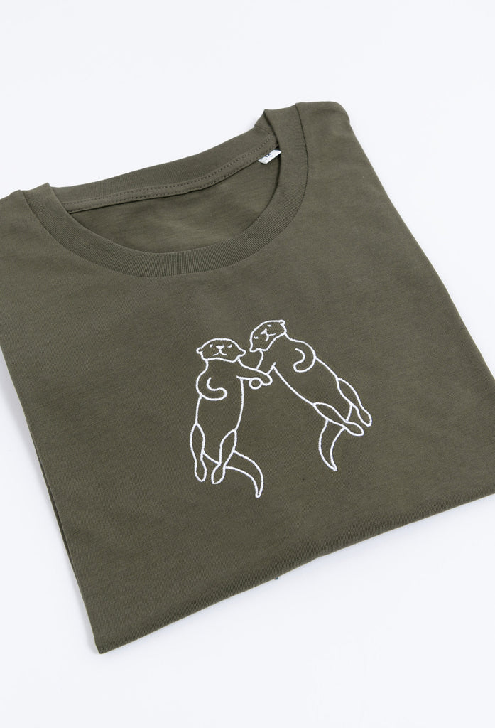 family of otters unisex cropped t-shirt Big Wild Thought