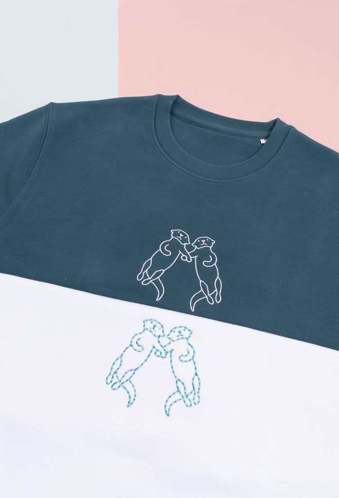 family of otters unisex t-shirt Big Wild Thought